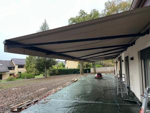 Store toile à bras télescopiques